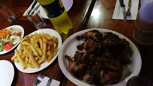 Pollos y Parrilladas El Leñador